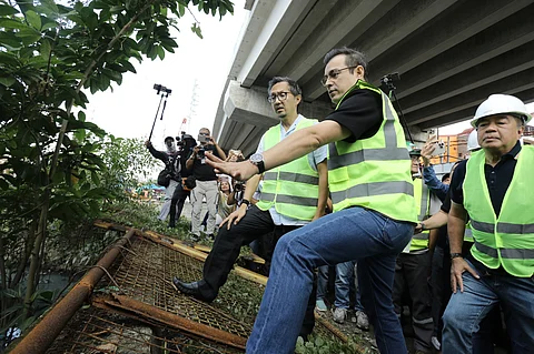 Department of Transportation Secretary Vince Dizon (left) joins Manila Mayor Francisco ‘Isko Moreno’ Domagoso during the clearing operations along Old Antipolo Street in Manila on Tuesday to address the area’s flood control issues.