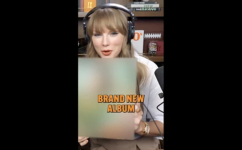 Taylor Swift teasing 'The Life of a Showgirl' vinyl.
