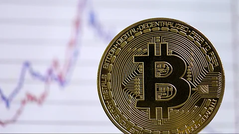 Bitcoin hits record $124,480 on corporate buys, US policy boost