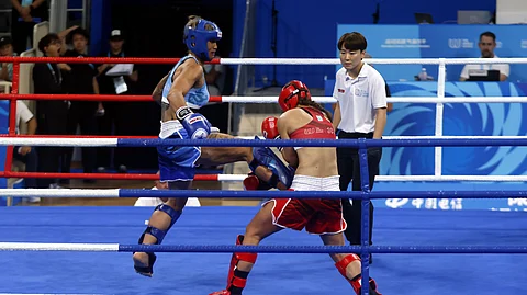 HERGIE Bacyadan (left) will go home with a broken heart after losing the World Games bronze medal in the women’s K1-70-kg kickboxing event in controversial fashion.