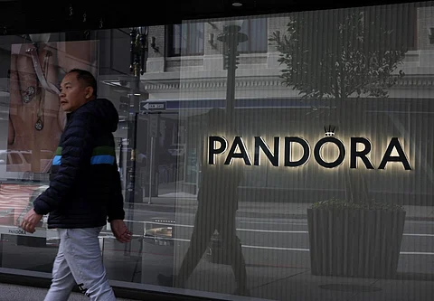 SAN FRANCISCO, CALIFORNIA - MAY 08: A pedestrian walks by a Pandora jewelry store on May 08, 2025 in San Francisco, California. Danish jewelry chain Pandora is warning of significant price increases if the Trump administration's proposed tariffs are enacted. Most of Pandora's jewelry is made in Thailand, Vietnam, India, and China.
