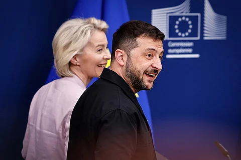 Ukraine's President Volodymyr Zelensky (R) and European Commission President Ursula Von der Leyen leave at the end of a joint press conference in Brussels, on 17 August 2025.
