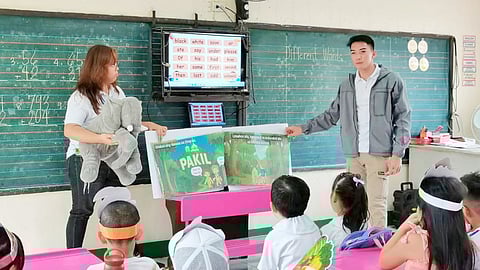 MEMBERS of the Tanglaw Women of Pakil micro-enterprise make commercial candles for a living (top). Pakil Mayor Ronald James Hidalgo (above) distributes food bags donated by Prime Infra Foundation and volunteer storytellers bring fun to classrooms.
