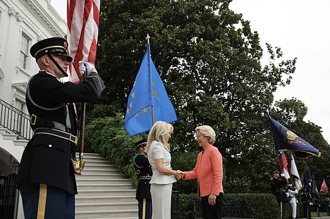 WASHINGTON, DC - AUGUST 18: European Commission President Ursula von der Leyen (R) is greeted by U.S. Chief of Protocol Monica Crowley as she arrives at the White House for a meeting with U.S. President Donald Trump and Ukrainian President Volodymyr Zelensky on August 18, 2025 in Washington, DC. President Trump is hosting President Zelensky at the White House for a bilateral meeting and later an expanded meeting with European leaders to discuss a peace deal between Russia and Ukraine.