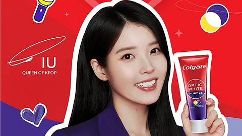 Behind IU’s sweet smile