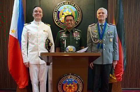 General Romeo S. Brawner Jr., AFP Chief of Staff, meets with LTC (GS) Philipp Doert, outgoing German Non-Resident Defense Attaché, and CDR Michael Radtke, incoming German Non-Resident Defense Attaché, during a courtesy call at Camp Aguinaldo, Quezon City on August 20, 2025.