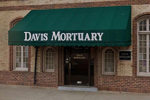 Rotting bodies found behind
fake door at mortuary