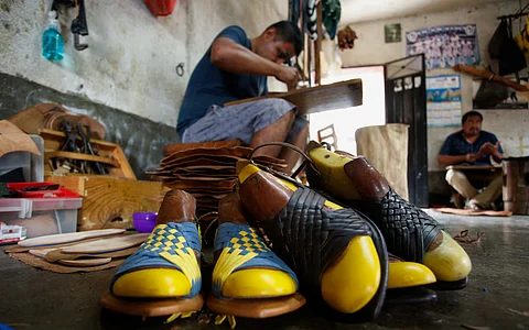Traditional Indigenous sandals are displayed in a workshop as Juan Aquino crafts a sandal in Villa Hidalgo Yalalag. The Mexican government stepped in on Friday to arbitrate a disagreement between Indigenous artisans from Oaxaca and Adidas.