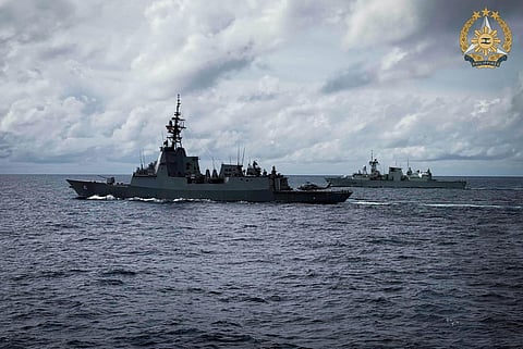 HMCS Ville de Québec (FFH332) conducts a cross-deck hoisting operation with HMAS Brisbane (DDG41) during a maritime cooperative activity under Exercise ALON on August 23, 2025. (Photo from AFP PAO)