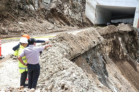 Crumbling shield President Ferdinand R. Marcos Jr., joined by Baguio City Mayor Benjamin Magalong, surveys the crumbling P273.93-million Kennon Road Rock Shed at Camp 6, Tuba, Benguet, on Sunday. Completed just months ago, the once-promising safety structure now lies eroded and unstable after typhoon ‘Emong,’ forcing a road closure that disrupted 35 percent of local livelihoods.