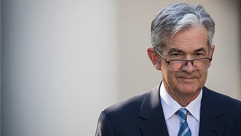 Dow hits record after Fed chair signals cut