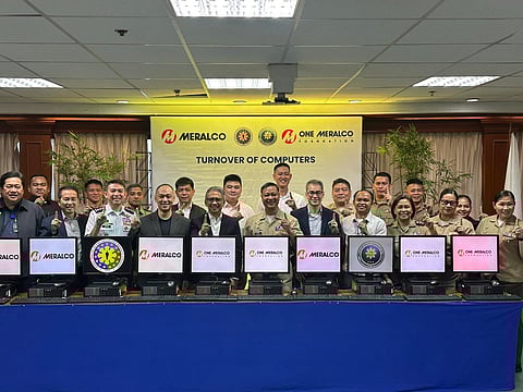 Empowering modern-day heroes. AFP Reserve Command Deputy Commander Col. Jose Tadeo Javier II (3rd from left), One Meralco Foundation President Jeffrey O. Tarayao (4th from left), Meralco First Vice President and Head of Networks Froilan J. Savet Tarayao (5th from left), AFP Pension and Gratuity Management Center Chief (AFPGMCC) Commo Luidegar Casis (center) and Meralco First Vice President and Head of Information Communication Technology and Transformation (ICTT) Roque D. Bacani (5th from right) during the turnover of the computer sets held at Meralco Main Office, Pasig City