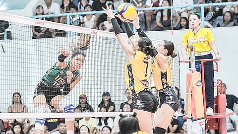 Ghanna Suan of USC penetrates the defense of USPF’s Katrina Inot and Belle Gallarde en route to a 22-25, 25-17, 25-23, 25-14 win during their 2025 SSL National Invitational Cebu leg Sunday in Mandaue City, Cebu.
