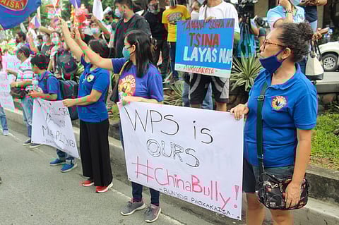 Youth groups stage protest at China embassy