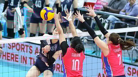 KOKORO Yasuma of Kobe Shinwa tries to break the defensive wall put up by Michele Gumabao and Pau Soriano of Creamline during their 2025 PVL Invitational match on Tuesday. The Japanese prevailed, 27-25, 25-23, 23-25, 25-21.