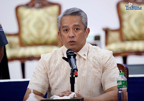 DILG Secretary Jonvic Remulla reads a statement at Camp Crame, Quezon City, announcing the relief of PNP Chief Gen. Nicolas Torre III and the appointment of PLt. Gen. Jose Melencio Nartatez Jr. as the new police chief during a press briefing on Tuesday.