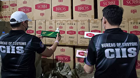 BOXES of illicit cigarettes from China and Vietnam are presented to the media by Customs Commissioner Ariel Nepomuceno inside Warehouse 6 of the Phil-Asia Industrial Compound, Plaridel, Bulacan, on 27 August 2025. The raid was led by MICP-CIIS chief Alvin Enciso.