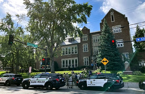 Police and first responders work at the scene of a shooting near Annunciation Church and Catholic School in Minneapolis, Minneosta, on August 27, 2025.