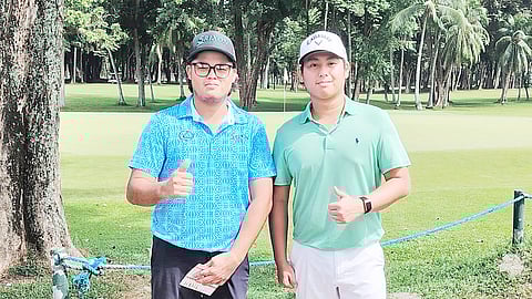 Best friends Perry Josef Bucay (right) and Santino Laurel flash the thumbs-up signs after taking control of the Philippine Amateur Championships at the Apo Golf and Country Club in Davao City on Sunday.