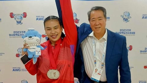 MONICO Puentevella (right) and the Samahang Weightlifting ng Pilipinas are moving on from the two-year suspension imposed on Vanessa Sarno.