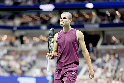 CARLOS Alcaraz, now sporting a buzz cut, celebrates after making short work of Mattia Bellucci 6-1, 6-0, 6-3 in the second round of the US Open at the Arthur Ashe Stadium main court.