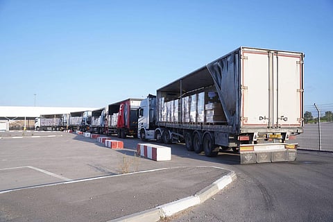 At Kerem Shalom, aid trucks bound for Gaza sat full, yet, abroad, the story told was famine.
