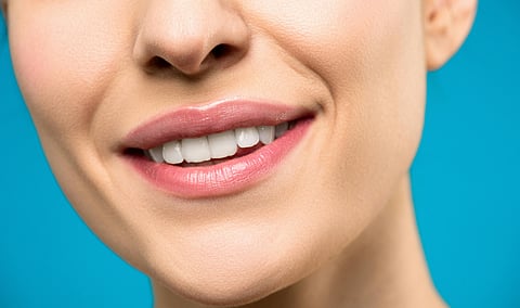 Photo by Shiny Diamond: https://www.pexels.com/photo/close-up-photo-of-woman-with-pink-lipstick-smiling-3762402/