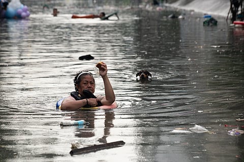 Barangay Santo Domingo in Quezon City is submerged in flood as localized thunderstorms bring intense rain in Metro Manila and nearby provinces on the afternoon of 30 August 2025.