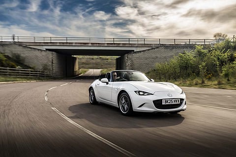 THE Mazda MX-5 Roadster takes a corner with the same lightweight spirit that has made it the world’s favorite convertible.