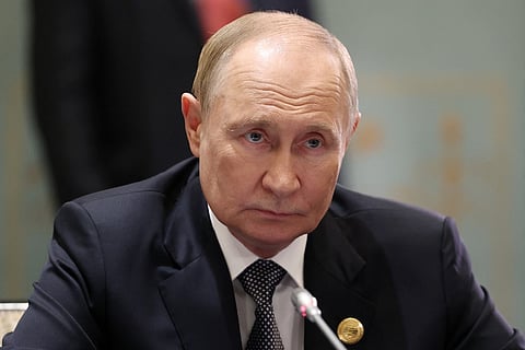 In this pool photograph distributed by the Russian state agency Sputnik, Russia's President Vladimir Putin attends a meeting with Iran's president on the sidelines of the Shanghai Cooperation Organisation (SCO) Summit in Tianjin on September 1, 2025.