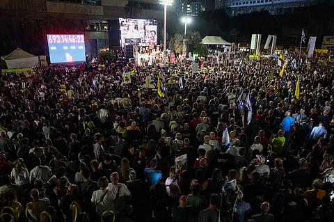 Protesters attend a demonstration organised by the families of Israelis held hostage by Palestinian militants in the Gaza Strip, to call for their release and for a ceasefire in the war in Gaza, at 'Hostage Square' in Tel Aviv on August 30, 2025. Israel's plans to expand the Gaza war have drawn opposition in the country, where many fear they will jeopardise the lives of the remaining hostages in Gaza, with a statement from the Hostages and Missing Families Forum saying 'military pressure kills hostages' ahead of a weekly protest in Tel Aviv.