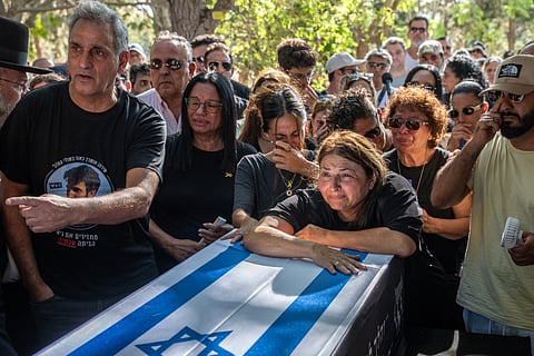 The mother of Israeli hostage Idan Shtivi and relatives react by his coffin during his funeral in Kfar Maas, in central Israel, days after the remains of two hostages were recovered from Gaza in a military operation.