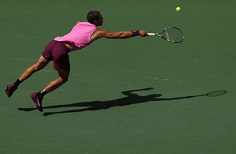 NEW YORK, NEW YORK - SEPTEMBER 02: Carlos Alcaraz of Spain returns to Jiri Lehecka of Czechia during their Men's Quarterfinal match on Day Ten of the 2025 US Open at USTA Billie Jean King National Tennis Center on September 2, 2025 in the Flushing neighborhood of the Queens borough of New York City.