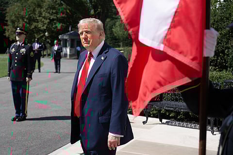 US President Donald Trump waits for Polish President Karol Nawrocki to arrive on the South Portico at the White House in Washington, DC on September 3, 2025. The two leaders witnessed two successive flyovers, one of F-35s and then a flight of F-16s performing a “missing man” formation, during the earlier greeting on the South Portico.