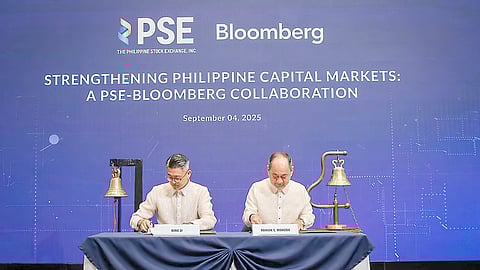 Bloomberg APAC head of sales Bing Li (left) and PSE president and CEO Ramon S. Monzon sign a Letter of Intent to formalize a partnership boosting the local capital market.