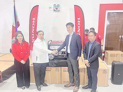 HONDA Philippines president Takeshi Kobayashi (second from right) formally turns over the generator sets to the Philippine Red Cross, received by Chairman Richard Gordon (second from left), Secretary General Gwendolyn Pang and Juan Gerry Datario (right), HPI assistant vice president, Administration Division.