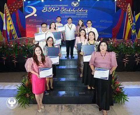 Monetary Board member Jose Querubin (top row, center) and Bangko Sentral ng Pilipinas Deputy Governor Bernadette Romulo-Puyat (top row, right) led the ceremony on the recognition of outstanding partners of the BSP Mindanao Regional Office in Butuan City.