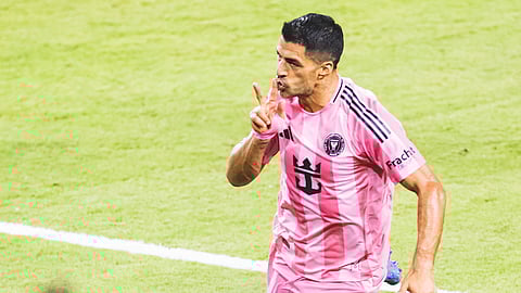 Spitting Suarez gets 3-match ban
