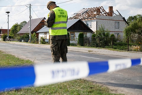 POLISH soldiers inspect a house in Wyryki-Wola damaged after drones allegedly from Russia violated the country’s airspace.