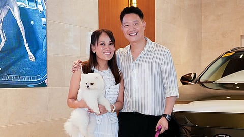A good-looking fur family: Dr. Z Teo, Dr. Aivee with furkids (white Pomeranian Roswell) carried by fur mom with Giant Poodles Lisbon (looking at mom) and Oslo