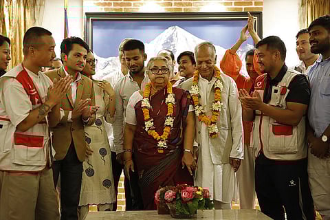 NEPAL’s newly appointed Prime Minister Sushila Karki (center) is congratulated by her supporters after the swearing-in-ceremony at the President House in Kathmandu on 12 September 2025.