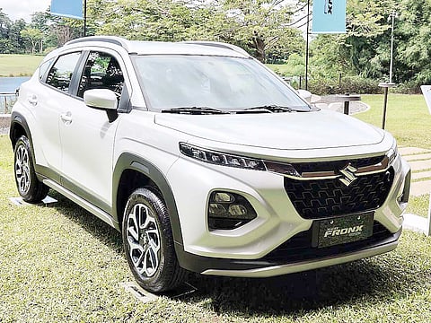 ONE of the Suzuki Fronx units displayed outdoors at the venue shows the crossover’s compact size and SUV-inspired stance.