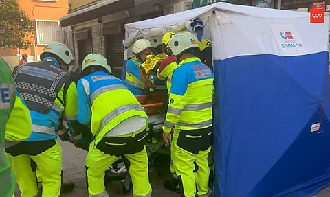 This screen grab of a handout video posted on the X (formerly Twitter) account of Madrid emergency services on September 13, 2025 shows emergency services members working after an explosion in a bar in Madrid's Vallecas neighbourhood. An explosion in a bar in Madrid's Vallecas neighbourhood injured 21 people, three of them seriously, Spanish emergency services said.