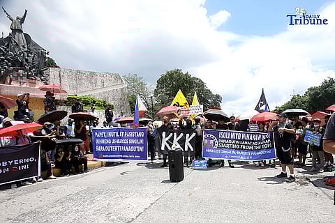 Rallyists converged at the People Power Monument in Ortigas Avenue on Saturday to hit corrupt officials in the controversial flood control projects.
