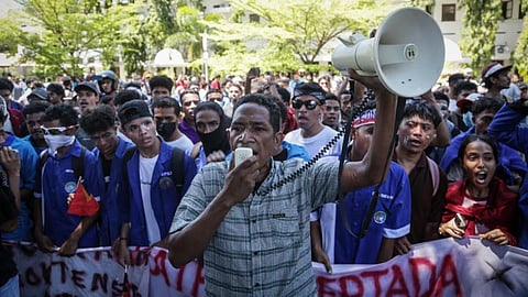 East Timor police fire tear gas at protest over legislators’ cars