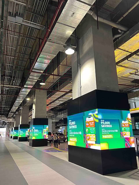 The transport hub in One Ayala Makati welcomes commuters with various LED screens, showing videos of advertisers and delighting the public.