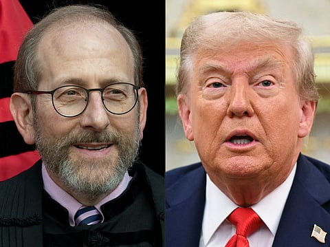 (COMBO) This combination of file photographs created on September 4, 2025, shows Harvard President Alan Garber as he attends the 374th Harvard Commencement in Harvard Yard in Cambridge, Massachusetts, on May 29, 2025 (L) and US President Donald Trump speaking as he meets with Poland's President in the Oval Office at the White House in Washington DC on September 3, 2025. A US judge ordered the Trump administration on September 3, 2025 to overturn deep funding cuts to Harvard University that froze more than $2 billion over allegations of antisemitism and bias at the Ivy League institution.