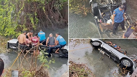 RESCUERS retrieve the body of a 56-year-old businessman after his Nissan Navara pickup plunged off the PNR Bridge in Barangay Salaan.