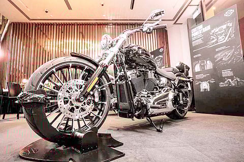THE new Breakout stands out with its stretched stance, round headlamp, and bold 26-spoke wheels.
