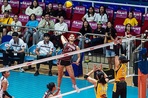 CASIEY Dongallo soars for a spike to power University of the Philippines to a 25-22, 18-25, 25-19, 18-25, 15-13 win over University of Santo Tomas in the 2025 Shakey’s Super League Preseason Unity Cup.